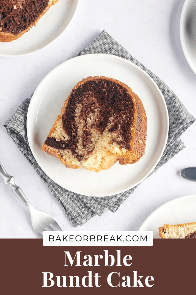 a slice of marble Bundt cake on a white plate; text overlay "Marble Bundt Cake bakeorbreak.com"