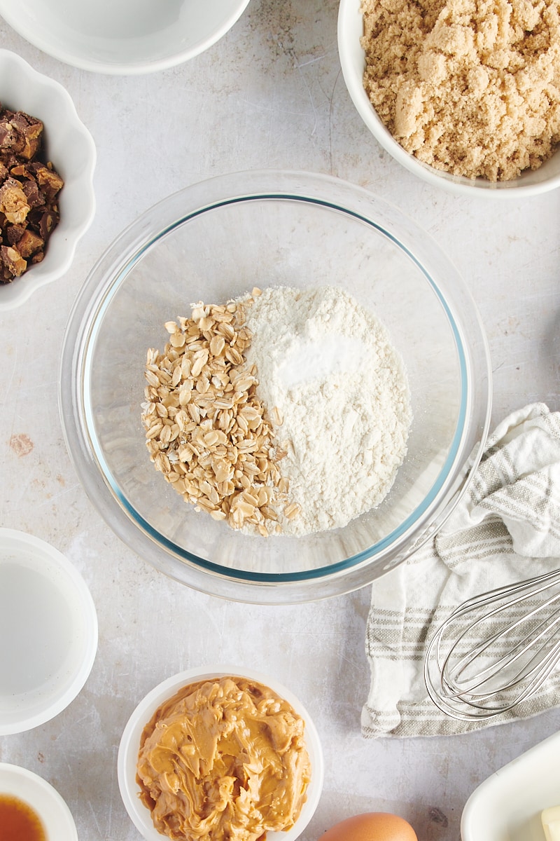 Overhead view of oats and flour in mixing bowl