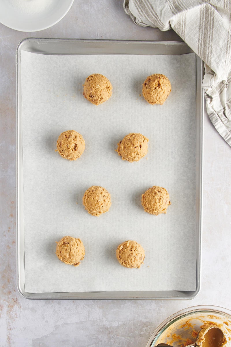 Overhead view of Outrageous Peanut Butter Cookie dough on baking sheet