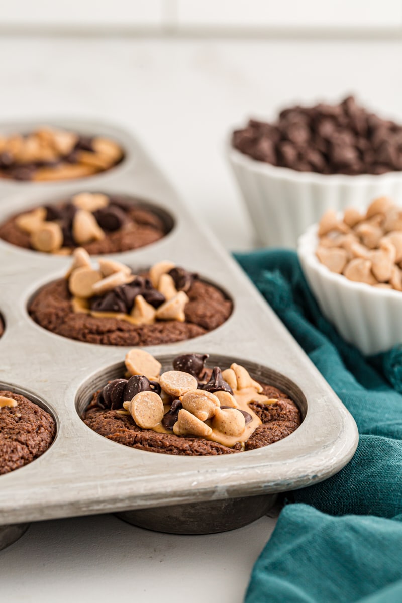 Brownie peanut butter cups in muffin tin