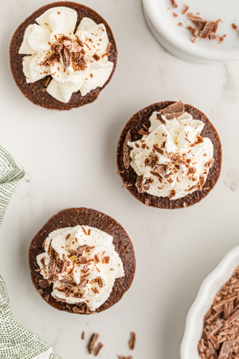 Overhead view of 3 chocolate mousse mini cupcakes