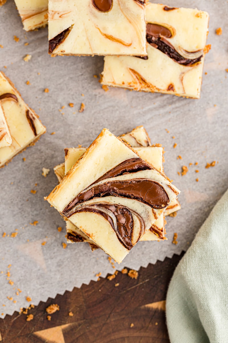 Overhead view of stacked Nutella swirl cheesecake bars