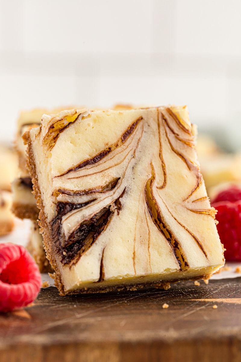 Nutella swirl cheesecake bar on side