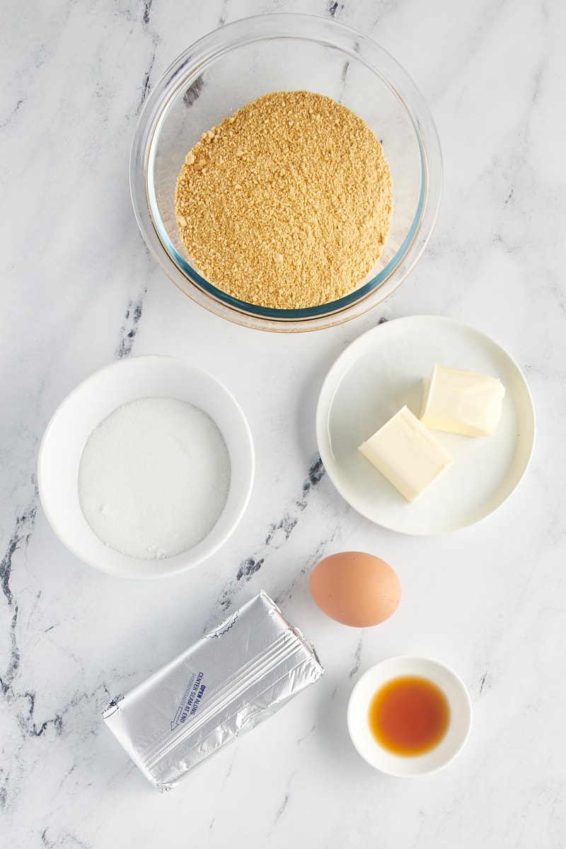 Overhead view of ingredients for mini cheesecakes.