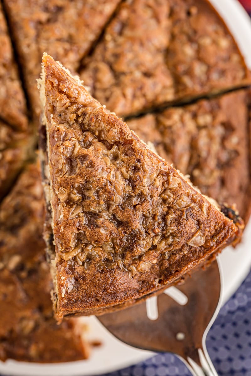 Slice of apple streusel coffee cake on spatula