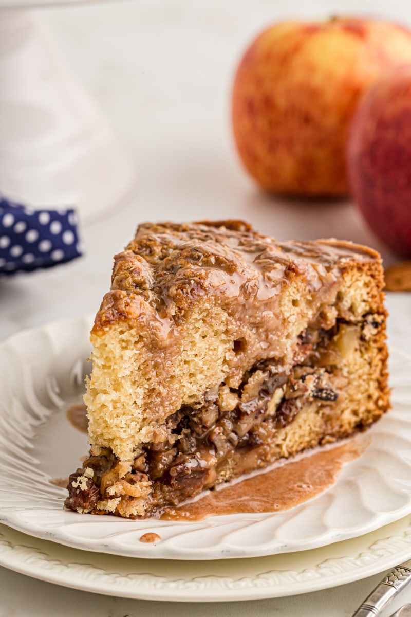 Slice of apple streusel coffee cake on plate