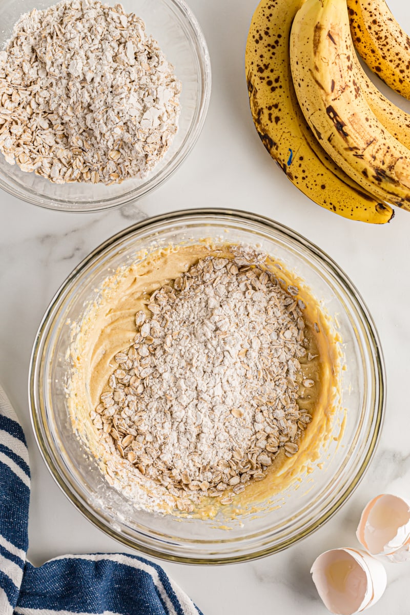 Overhead view of dry ingredients added to cake batter