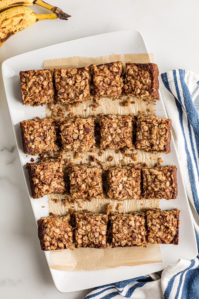 Overhead view of banana oatmeal crumb cake pieces on platter