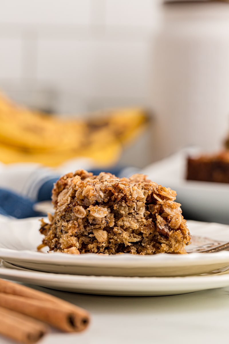 Piece of banana oatmeal crumb cake on plate