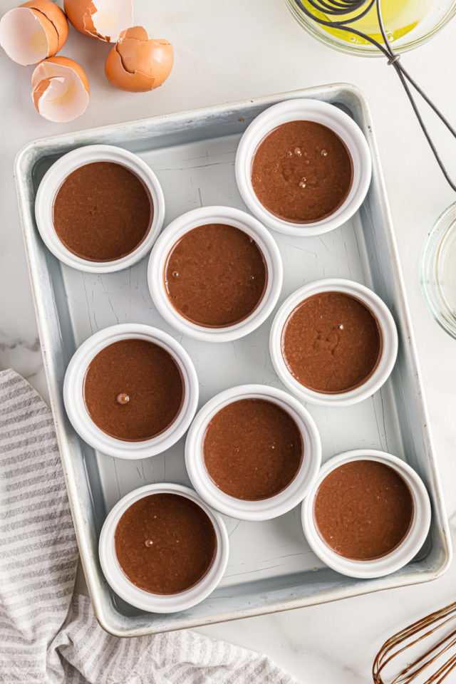 Overhead view of pots de creme in pan