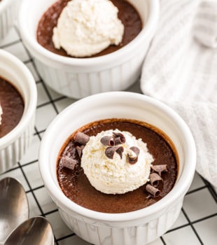Pots de creme on wire rack with spoons