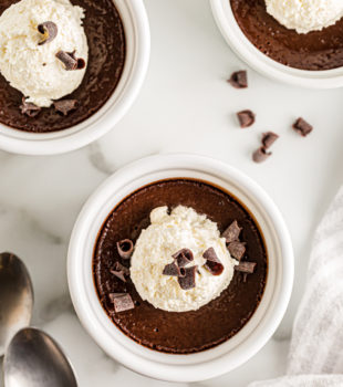 3 pots de creme topped with ice cream and chocolate curls
