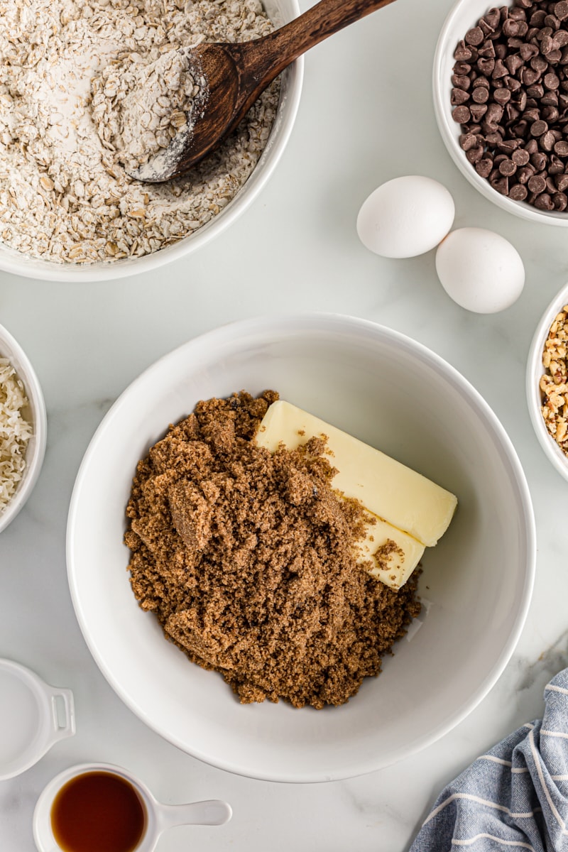 Overhead view of butter and sugar in mixing bowl