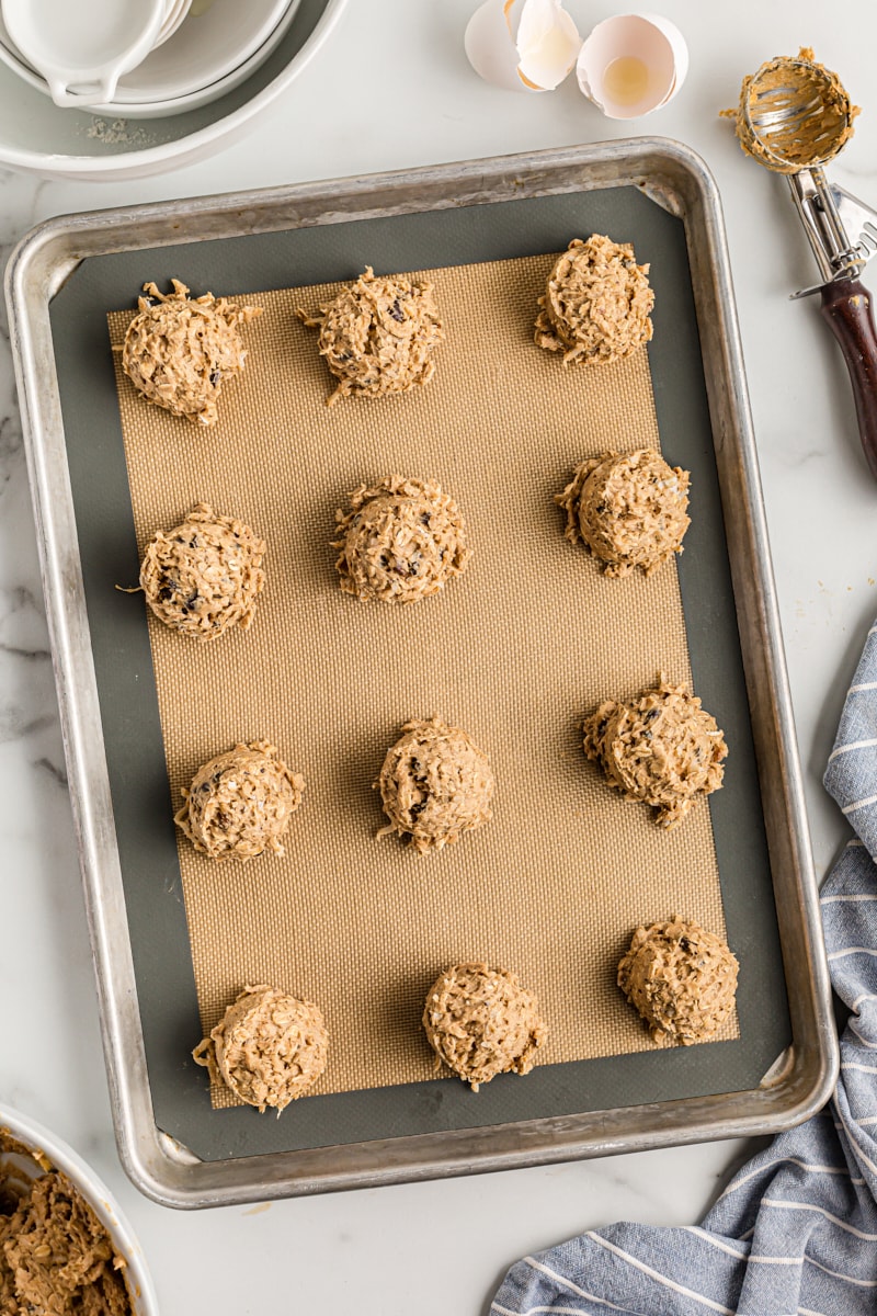 Cowboy cookie dough balls on baking sheet
