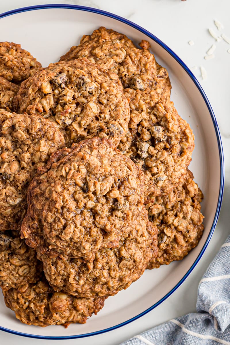 Cowboy cookies stacked on plate