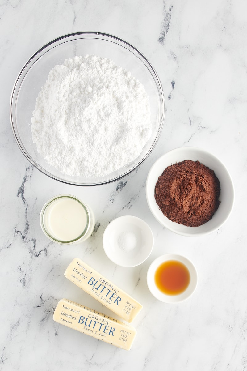 overhead view of ingredients for chocolate buttercream frosting
