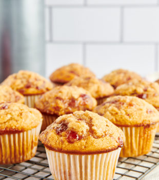 Peanut Butter and Jelly Muffins on a wire cooling rack