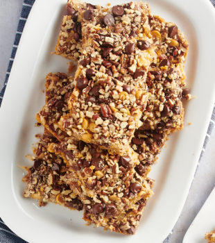 Seven layer magic bars stacked on platter