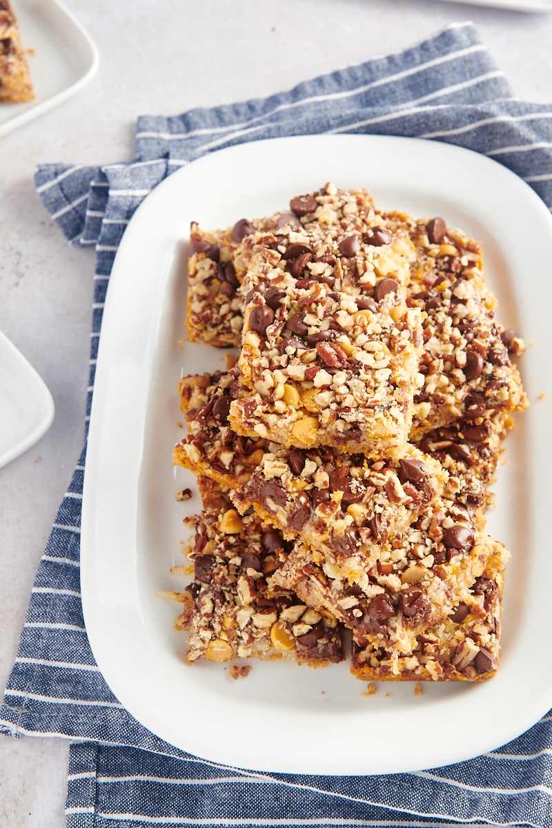 Seven layer bars stacked on white platter