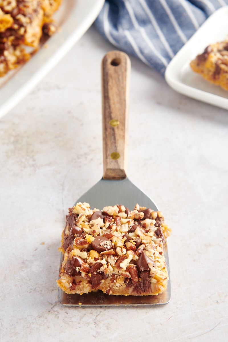 Seven layer bar on spatula