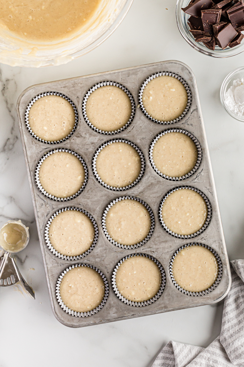 Overhead view of cupcake batter in pan