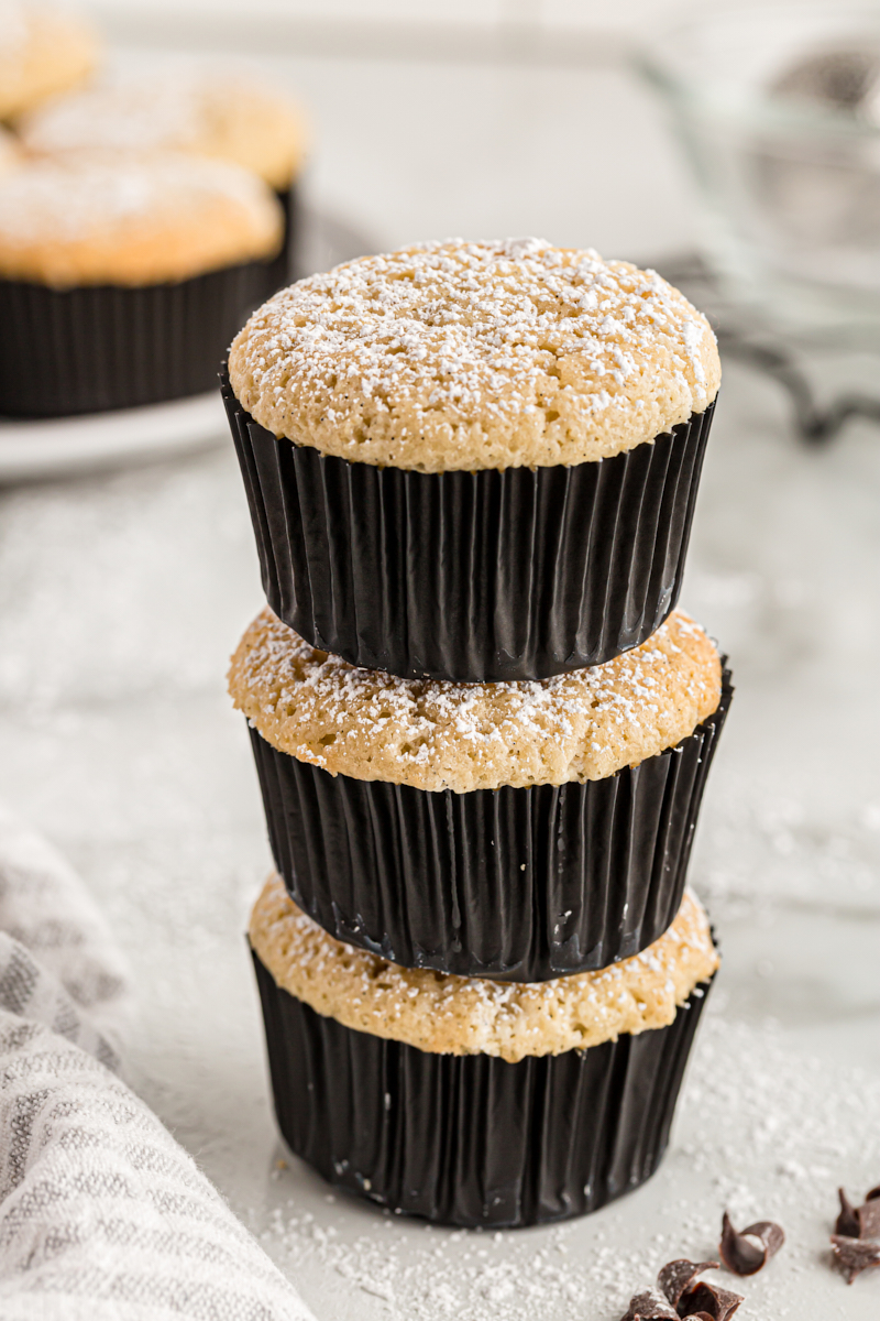 Stack of 3 vanilla chocolate-filled cupcakes