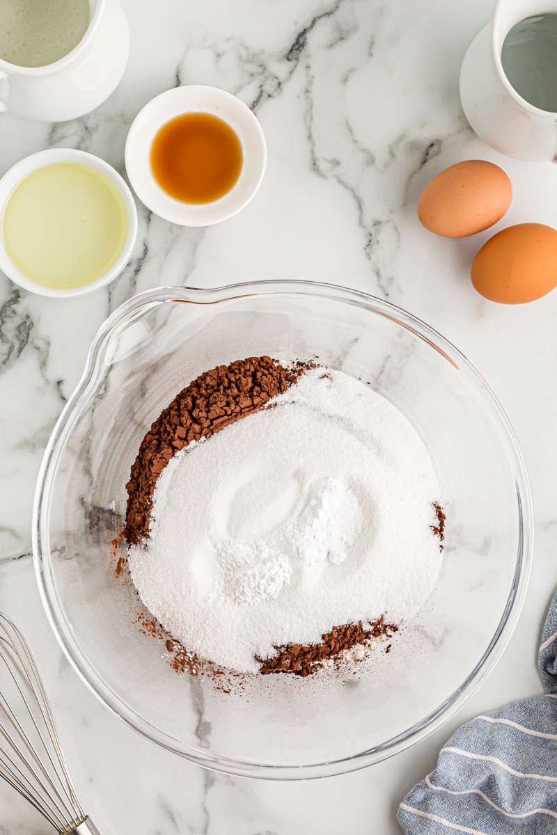 Overhead view of dry cupcake ingredients in mixing bowl