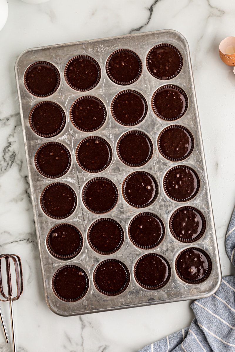 Overhead view of cupcake batter in pan