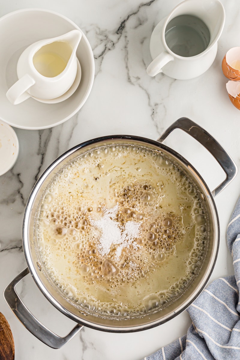 Overhead view of caramel simmering in pot