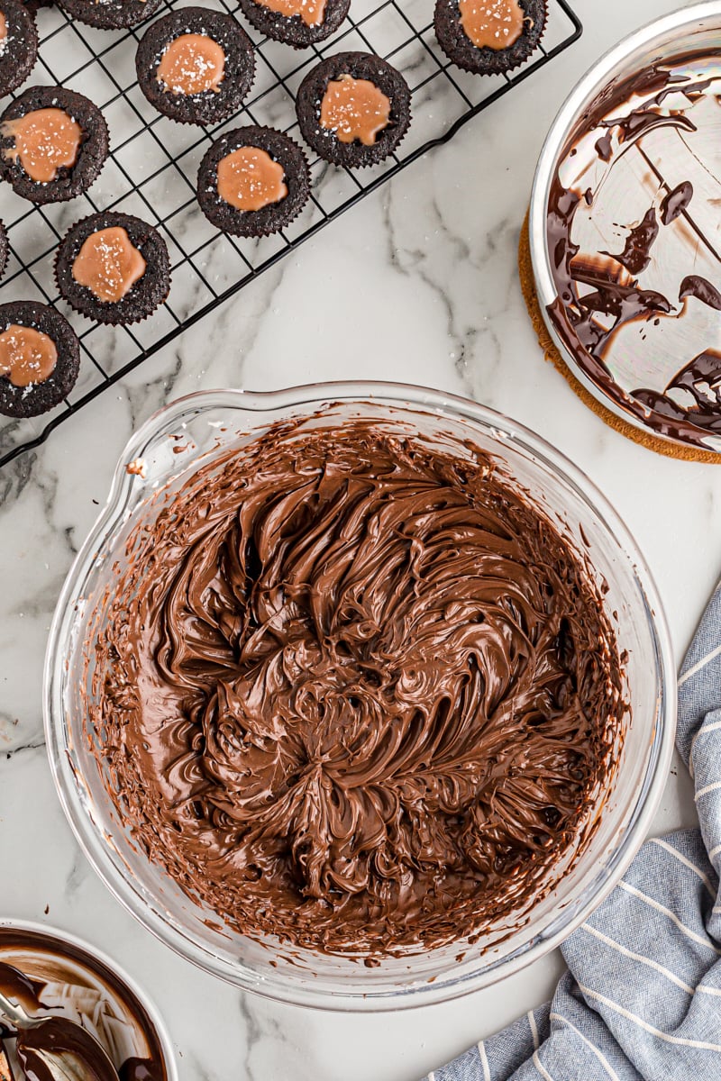 Overhead view of chocolate frosting in mixing bowl