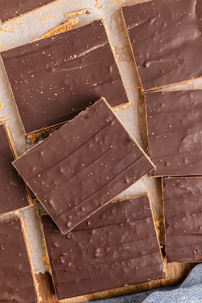 Overhead view of no-bake peanut butter bars cut into squares.