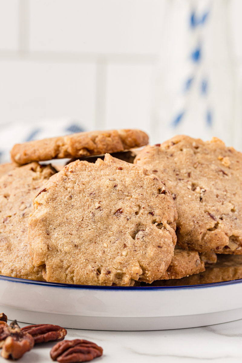 Plate of pecan sandies cookies.