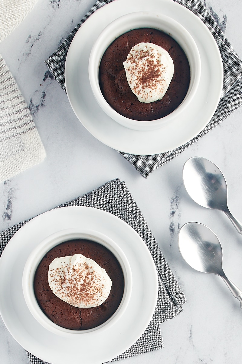 overhead view of Flourless Chocolate Cakes for Two on white plates