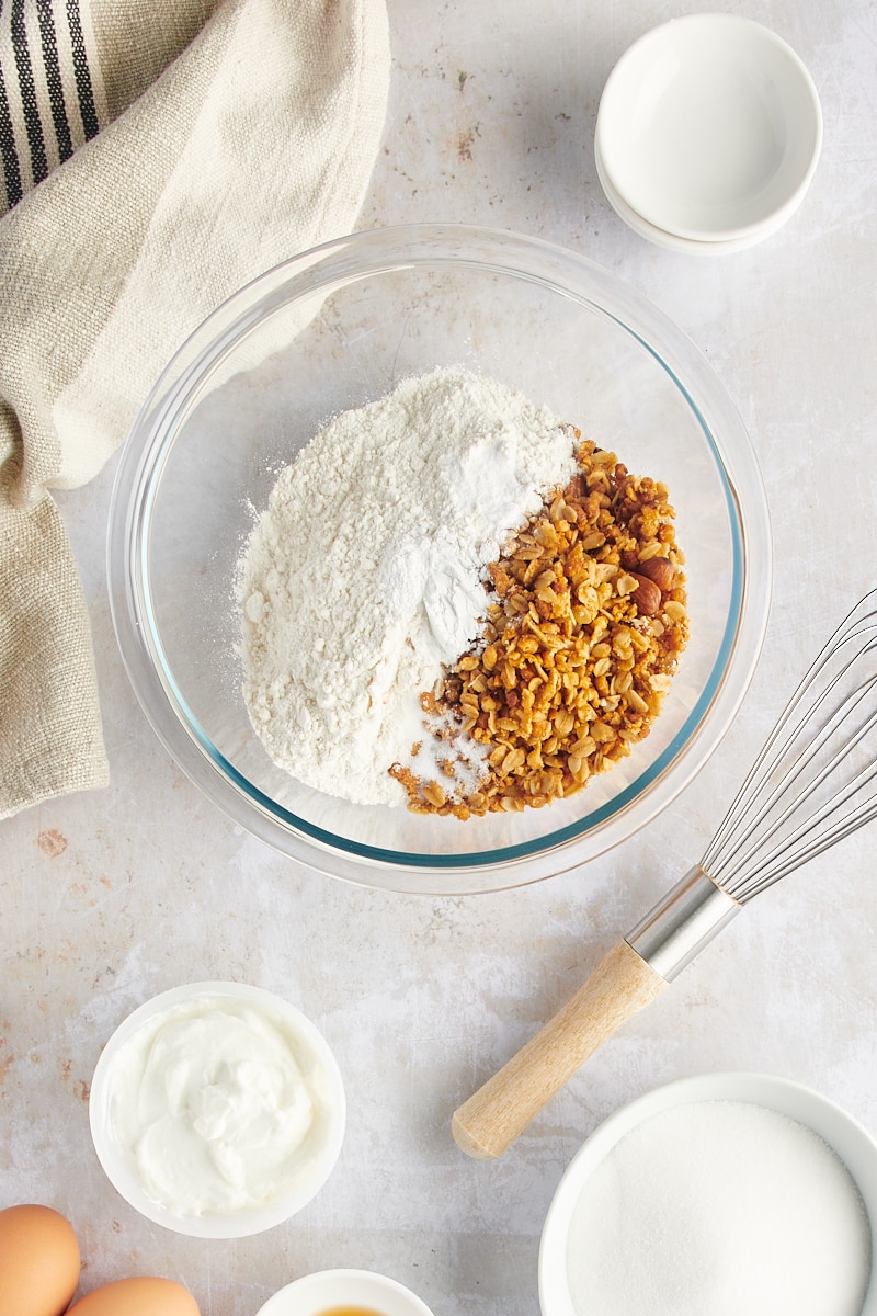 Overhead view of dry muffin ingredients in bowl before mixing