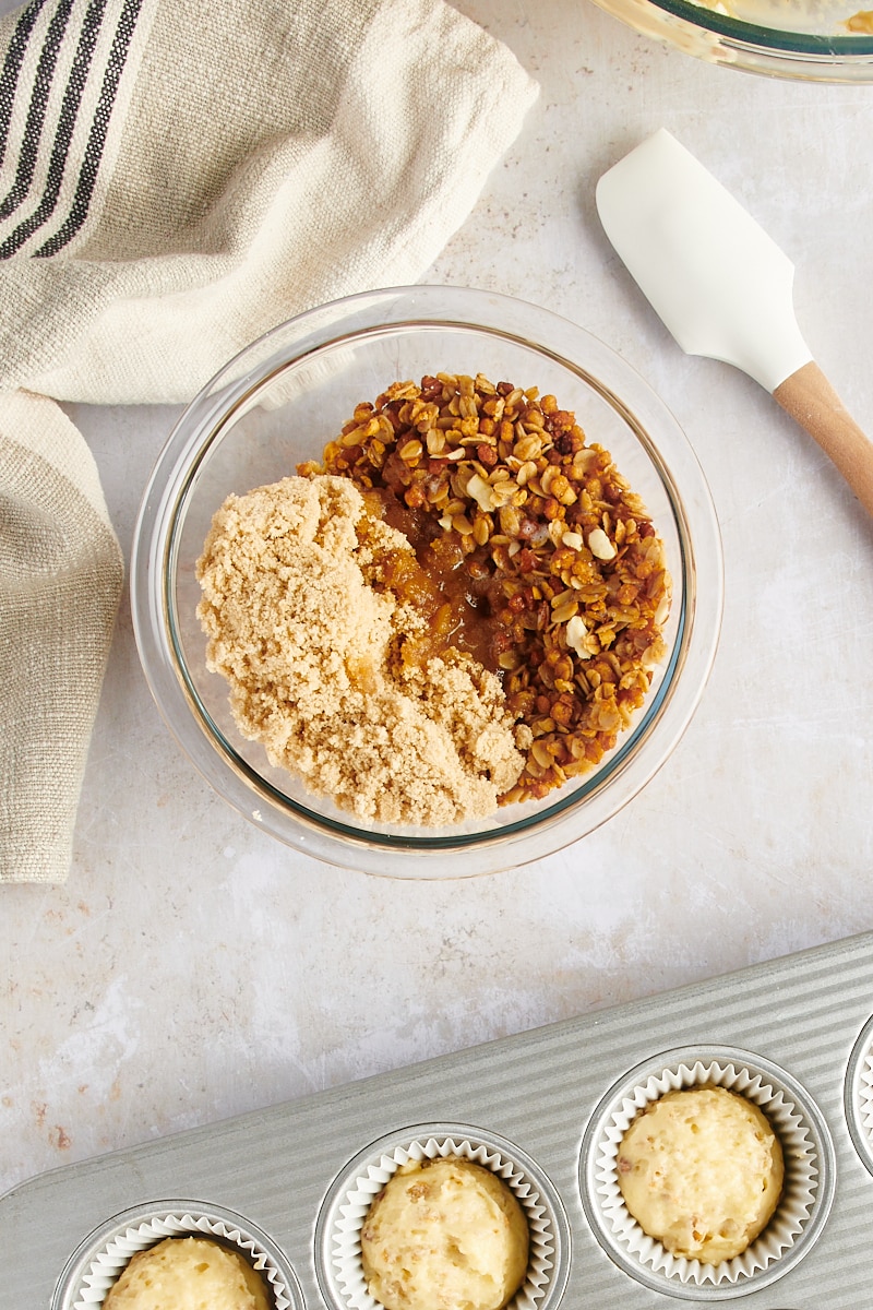 Overhead view of granola streusel ingredients in small bowl