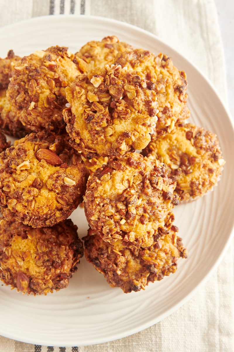 Overhead view of granola yogurt muffins stacked on platter