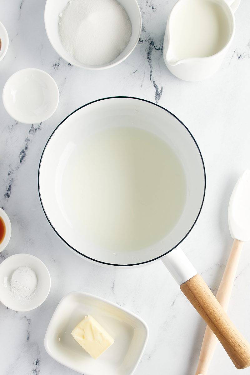 overhead view of milk and cornstarch in a saucepan