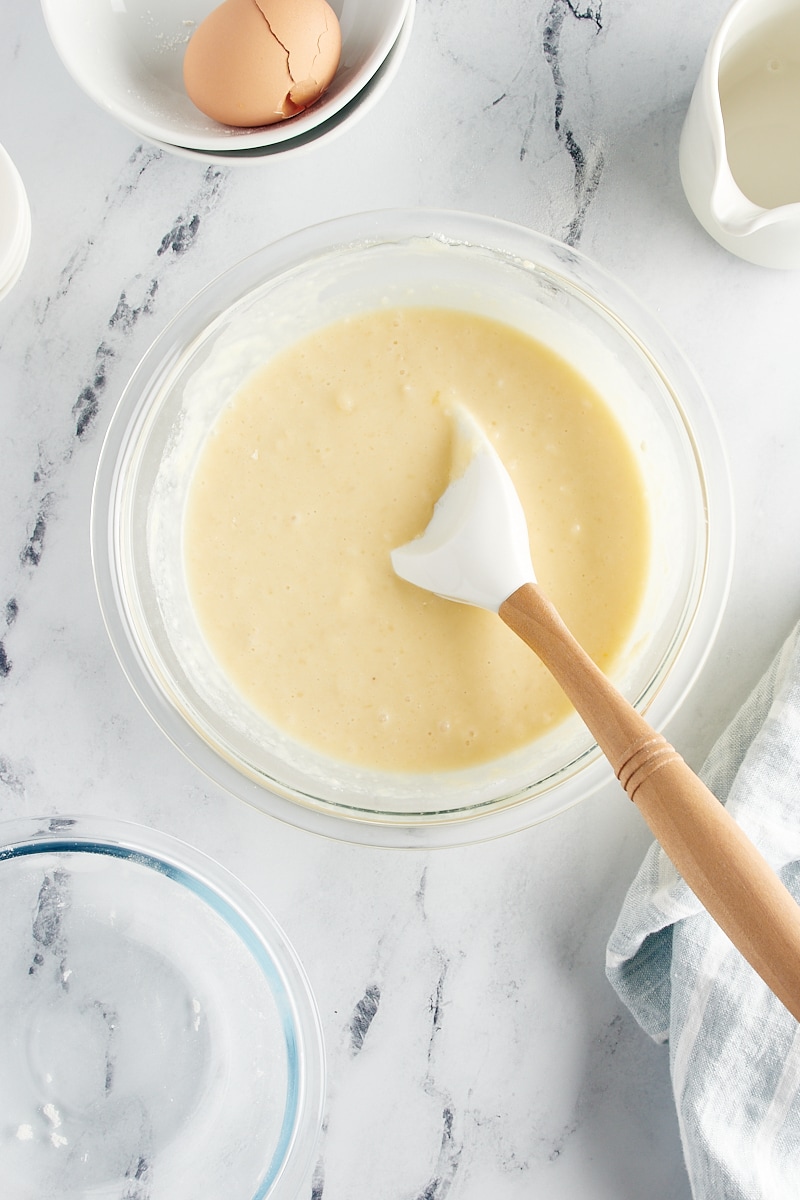 overhead view of mixed cake batter for Vanilla Pudding Cake