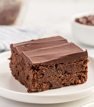 Chocolate mascarpone brownie on white plate