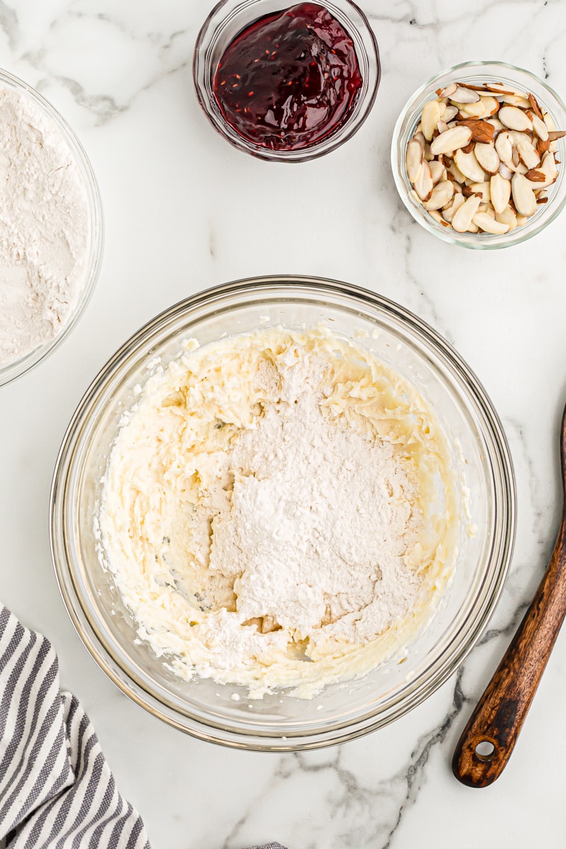 overhead view of flour added to crostata dough