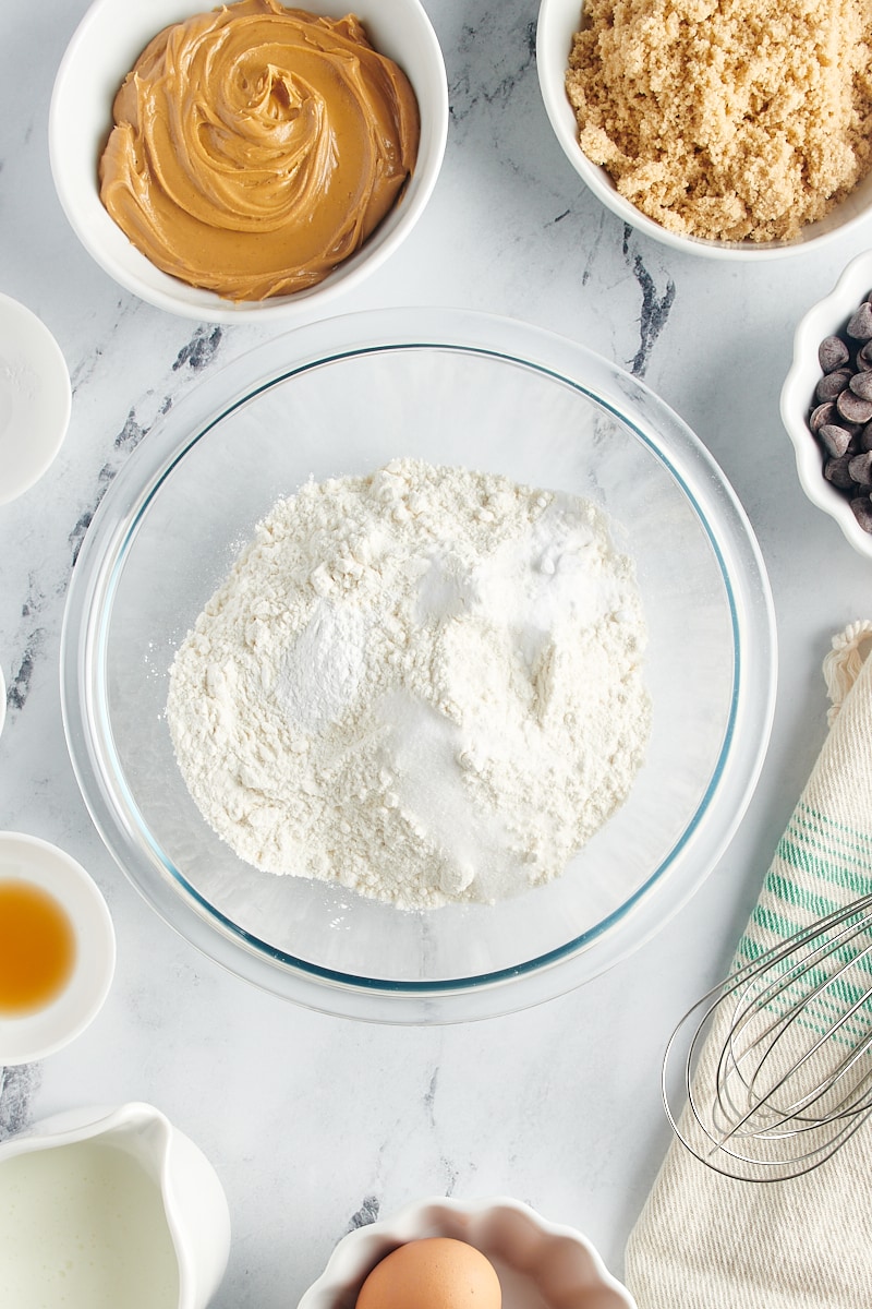 Overhead view of dry ingredients in mixing bowl before stirring