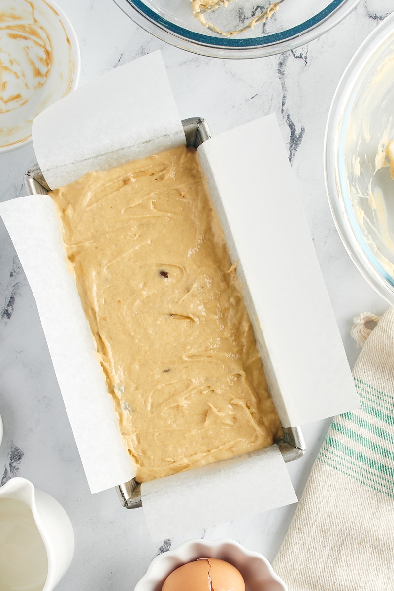 Overhead view of chocolate chip peanut butter bread batter in pan