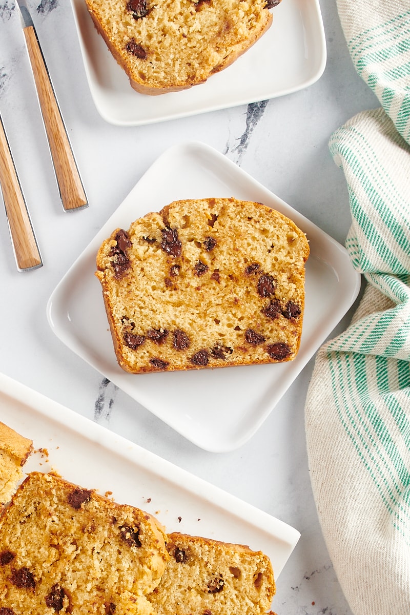 Overhead view of chocolate chip peanut butter bread slices on plates