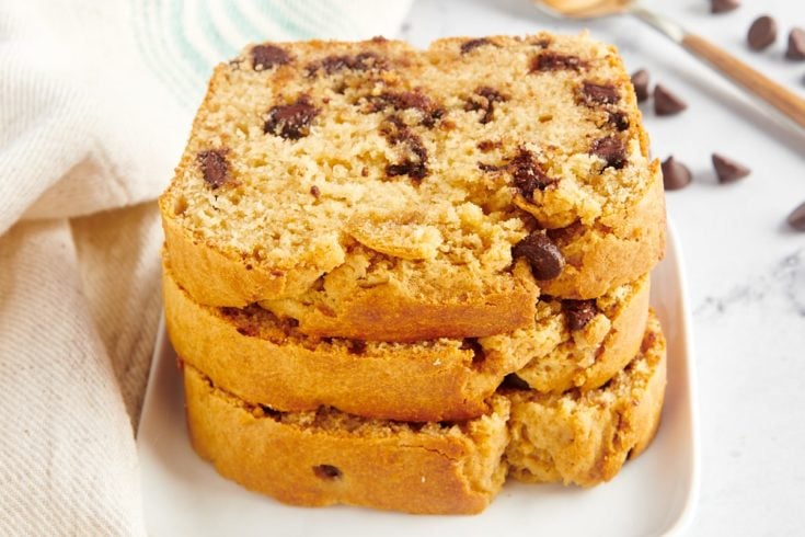 Stack of 3 chocolate chip peanut butter bread slices on plate