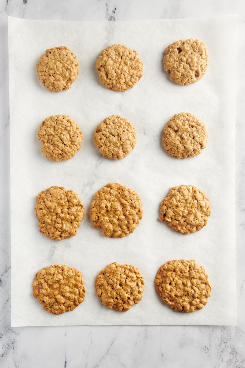 overhead view of two kinds of oatmeal cookies on parchment paper