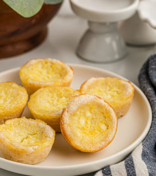 Lemon Chess Tartlets on a white plate
