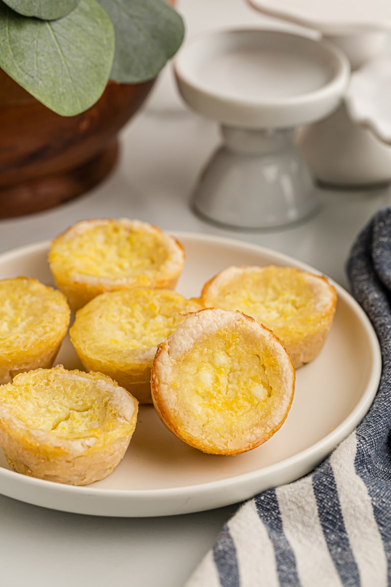 Lemon Chess Tartlets on a white plate