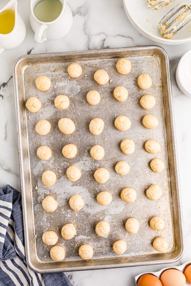 overhead view of portioned crust dough for lemon chess tartlets