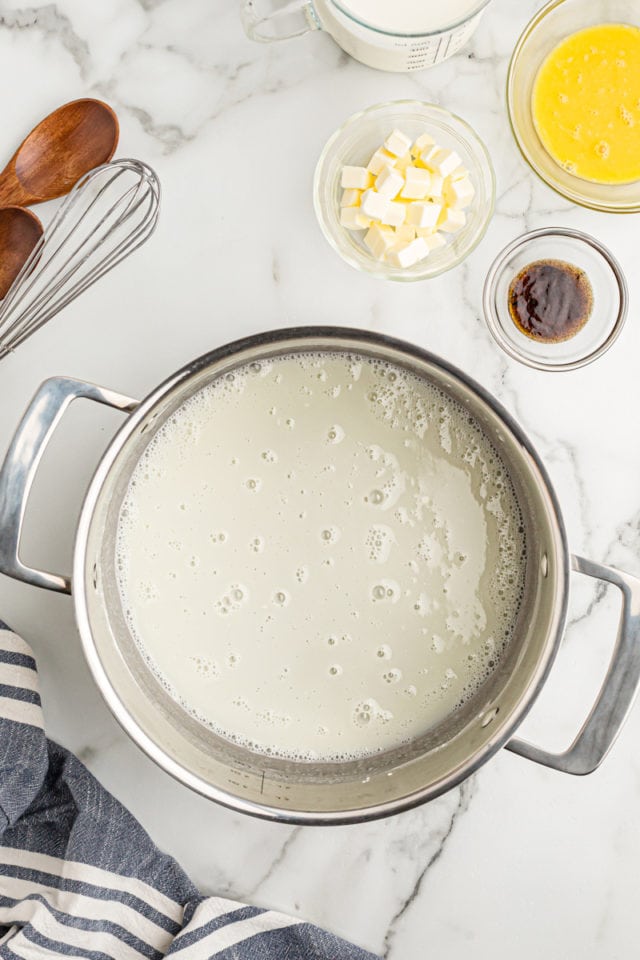 Overhead view of warm milk mixture in pan