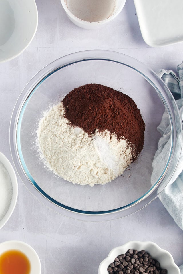 Overhead view of flour and cocoa in mixing bowl